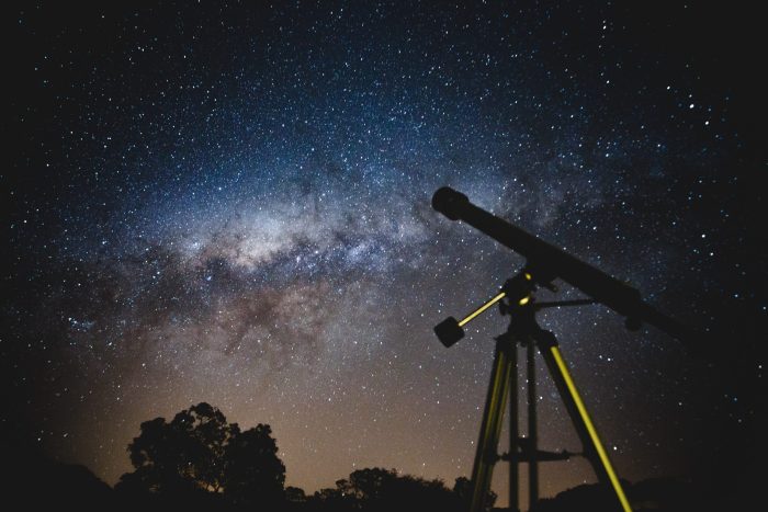 stargazing night sky with telescope