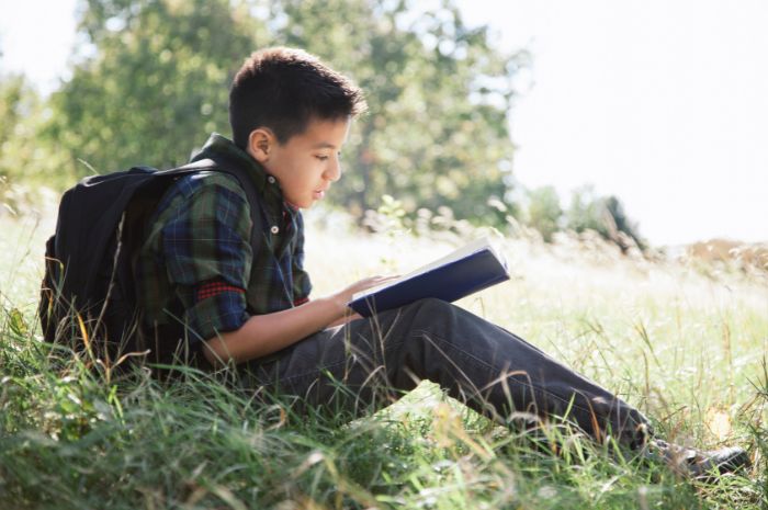 middle school student reading homeschool